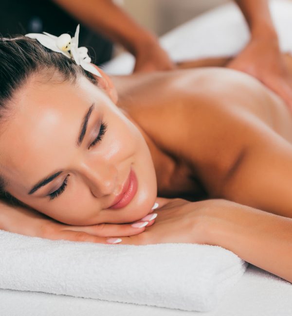 relaxing-woman-having-massage-at-spa-salon-2021-09-01-12-01-24-utc
